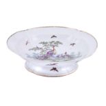 A WORCESTER PEDESTAL QUATREFOIL DESSERT DISH PAINTED WITH EXOTIC BIRDS IN THE MANNER OF GEORGE DAVIS