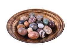 A COLLECTION OF APPROXIMATELY 27 VARIOUS POLISHED HARDSTONE MODELS OF EGGS