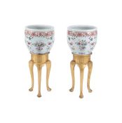 A PAIR OF CHINESE FAMILLE ROSE JARDINIERES WITH STANDS