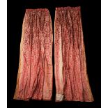 A PAIR OF GOLD AND CERISE SILK DAMASK CURTAINS