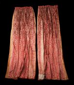 A PAIR OF GOLD AND CERISE SILK DAMASK CURTAINS