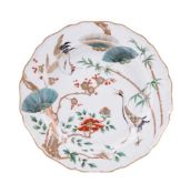 A WORCESTER ARITA STYLE PLATE PAINTED AND GILT WITH CRANES AND FLOWERING PRUNUS