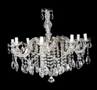 A FRENCH MOULDED AND CUT GLASS CHANDELIER