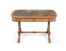 Y A VICTORIAN 'HUNGARIAN' ASH AND EBONY WRITING TABLE OR DESKIN THE MANNER OF HOLLAND & SON
