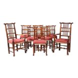 A SET OF EIGHT SPINDLE-BACK DINING CHAIRS WITH RUSH SEATS IN 18TH CENTURY STYLE