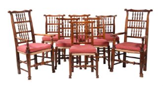 A SET OF EIGHT SPINDLE-BACK DINING CHAIRS WITH RUSH SEATS IN 18TH CENTURY STYLE