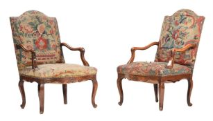 A PAIR OF FRENCH WALNUT AND TAPESTRY UPHOLSTERED FAUTEUILS