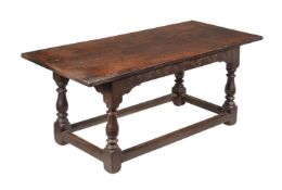 AN OAK REFECTORY TABLE IN 17TH CENTURY STYLE