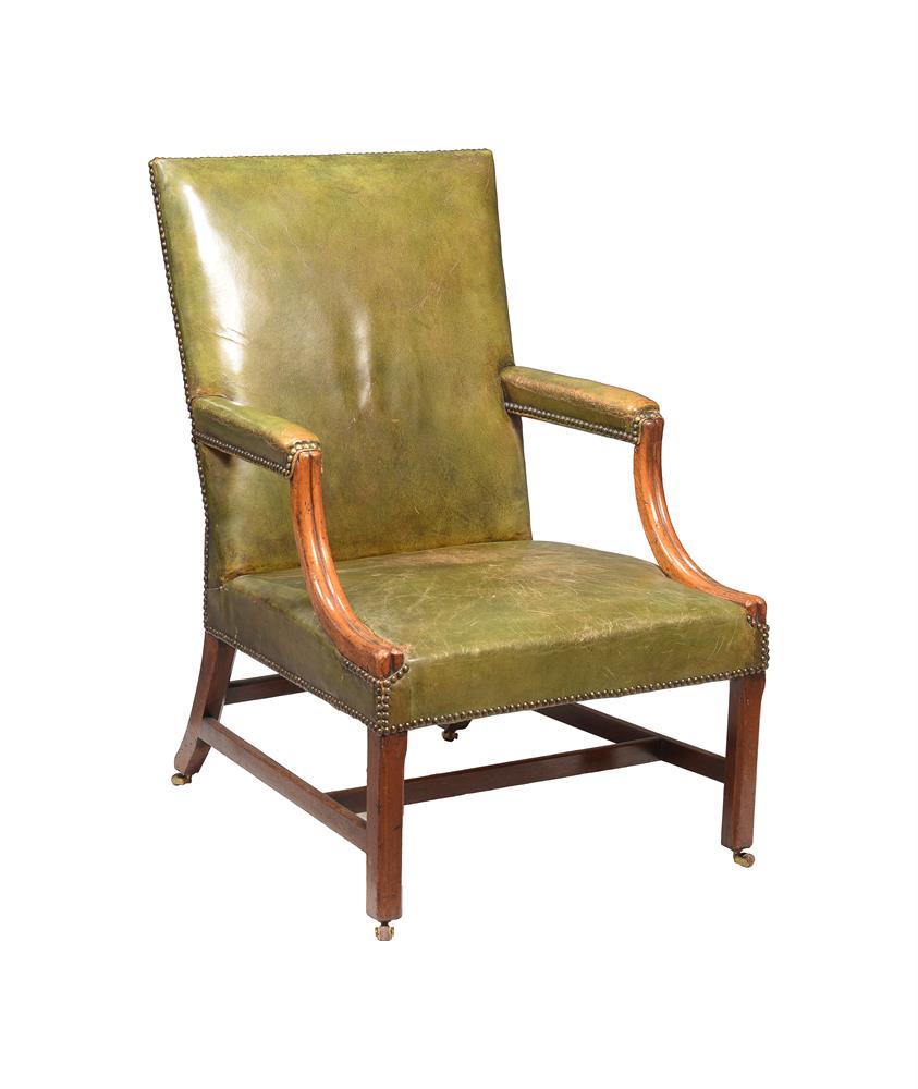 A GEORGE III MAHOGANY AND GREEN LEATHER UPHOLSTERED AMRCHAIR