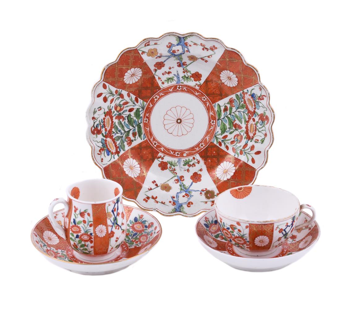 A WORCESTER 'SCARLET JAPAN' PATTERN BELL-SHAPED COFFEE CUP AND SAUCER