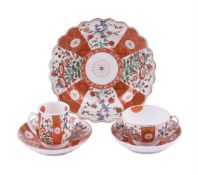 A WORCESTER 'SCARLET JAPAN' PATTERN BELL-SHAPED COFFEE CUP AND SAUCER