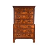 A GEORGE III MAHOGANY AND WALNUT CHEST ON CHEST