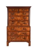 A GEORGE III MAHOGANY AND WALNUT CHEST ON CHEST