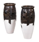A PAIR OF WHITE GLAZED CERAMIC AND PATINATED METAL FLOOR VASES