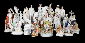 AN ASSORTMENT OF MOSTLY STAFFORDSHIRE POTTERY THEATRICAL GROUPS AND FIGURES