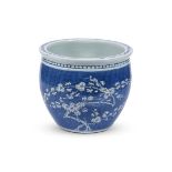 A CHINESE BLUE AND WHITE PRUNUS JARDINIERE