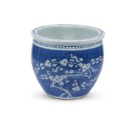 A CHINESE BLUE AND WHITE PRUNUS JARDINIERE