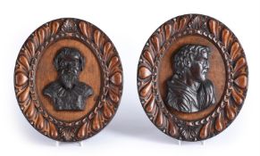 A PAIR OF CARVED OAK RELIEF PORTRAITS OF POETS