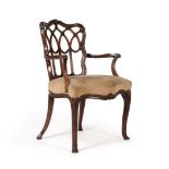 A GEORGE III MAHOGANY ARMCHAIR