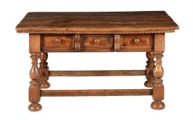 A SPANISH WALNUT REFECTORY TABLE