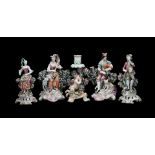 A GROUP OF FIVE VARIOUS ENGLISH PORCELAIN FIGURES