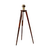 A BRASS-CASED REFLECTING PRISM ON MAHOGANY TRIPOD STAND