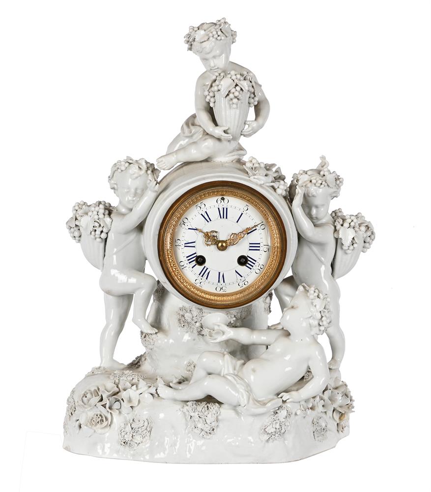 A FRENCH NAPOLEAN III CONTINENTAL PORCELAIN-CASED FIGURAL MANTEL CLOCK