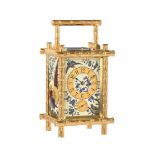 A FINE FRENCH GILT BAMBOO REPEATING ALARM CARRIAGE CLOCK WITH RELIEF CLOISSONNE ENAMEL PANELS