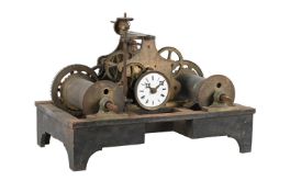 A SWISS BRASS AND STEEL SMALL TURRET CLOCK MOVEMENT