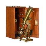 A VICTORIAN LACQUERED BRASS COMPOUND BINOCULAR MICROSCOPE