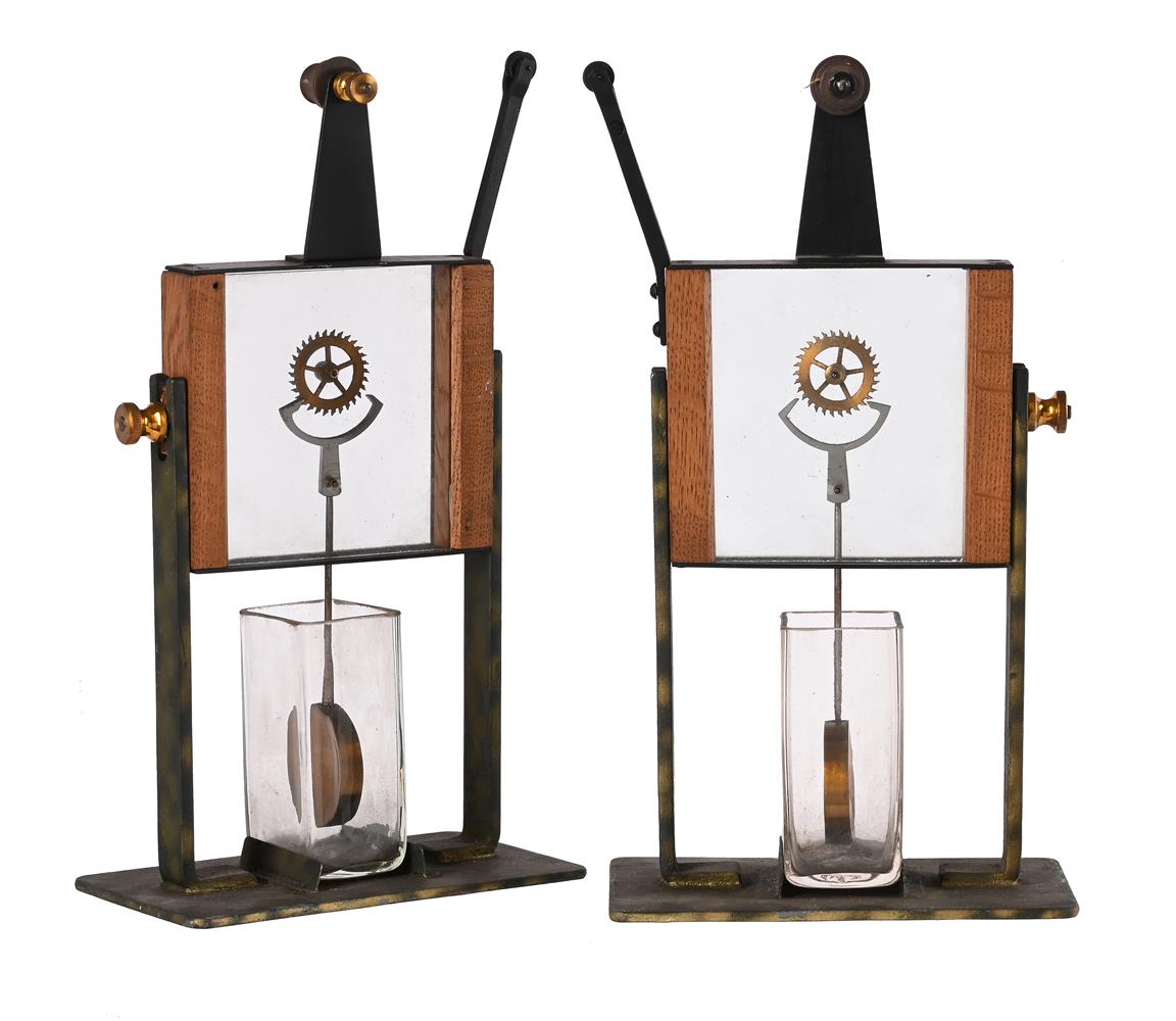 AN UNUSUAL PAIR OF LABORATORY CLOCK ESCAPEMENT DEMONSTRATION MODELS