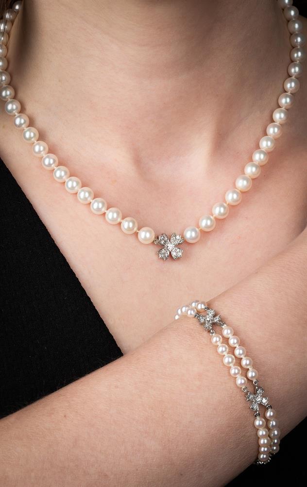 TIFFANY & CO., FLORET FLOURISHES, A DIAMOND AND CULTURED PEARL NECKLACE AND BRACELET - Image 3 of 3