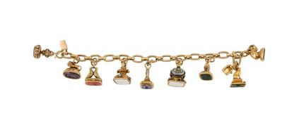 A MID 20TH CENTURY FRENCH BRACELET SUSPENDING VARIOUS 19TH CENTURY FOBS