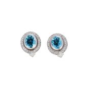 STEPHEN WEBSTER, A PAIR OF AQUAMARINE AND DIAMOND CLUSTER EARRINGS, LONDON 1997