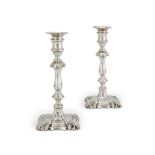 A PAIR OF WILLIAM IV SILVER CANDLESTICKS