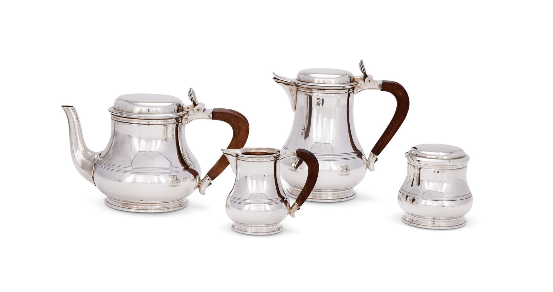 A FRENCH SILVER COLOURED FOUR PIECE BALUSTER TEA AND COFFEE SET