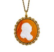 AN 1820S PASTE AND AGATE CAMEO PENDANT OF GEORGE III