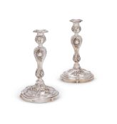 A PAIR OF RUSSIAN SILVER CANDLESTICKS