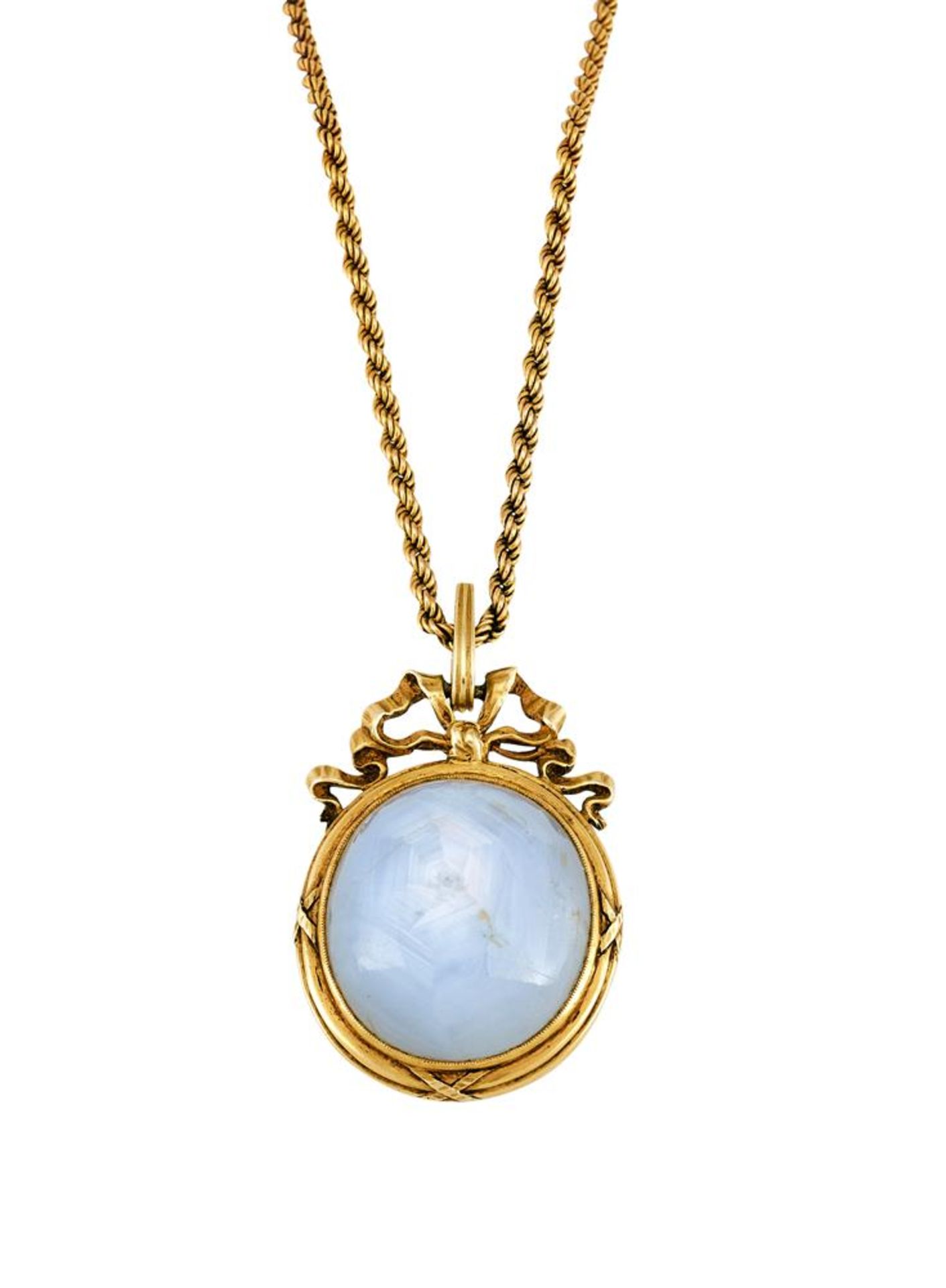 A FRENCH LATE 19TH CENTURY GOLD AND STAR SAPPHIRE PENDANT