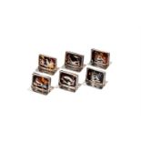 Y A CASED SET OF SIX SILVER AND TORTOISESHELL MENU HOLDERS