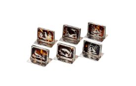 Y A CASED SET OF SIX SILVER AND TORTOISESHELL MENU HOLDERS