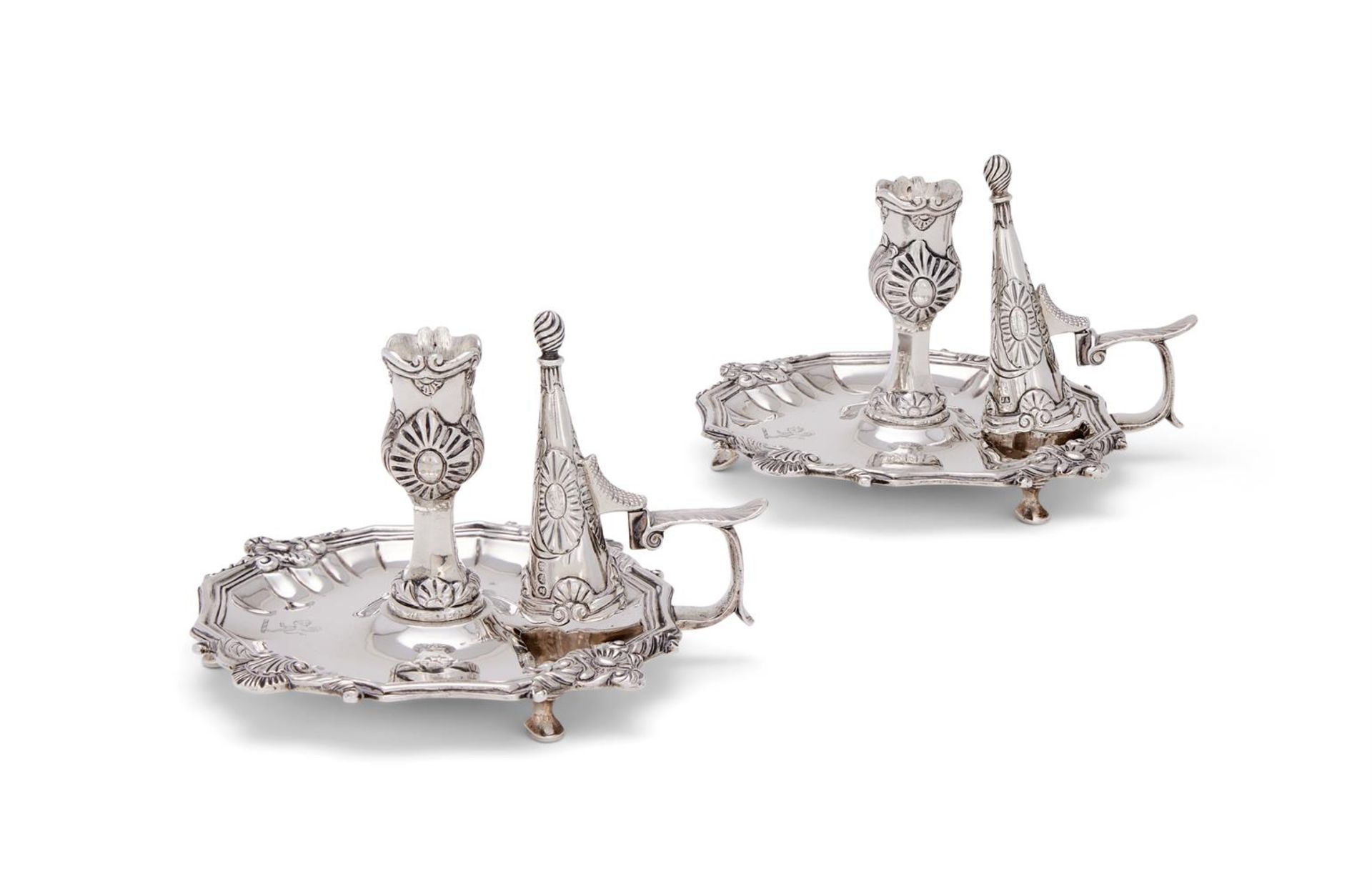 A PAIR OF GEORGE IV SILVER CHAMBERSTICKS