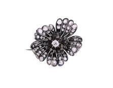 A LATE 19TH/EARLY 20TH CENTURY DIAMOND FLOWER BROOCH