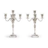 A CASED PAIR OF VICTORIAN SILVER FIVE LIGHT CANDELABRA