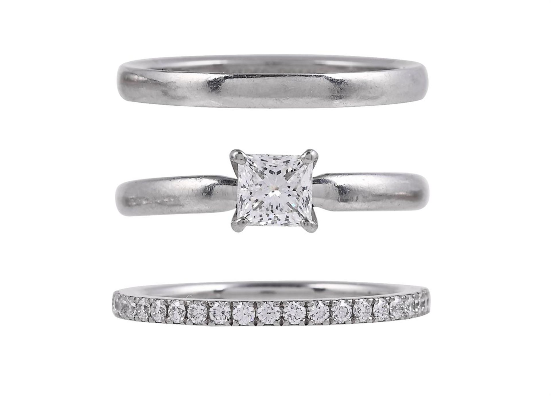 DE BEERS, SIGNATURE, A SINGLE STONE DIAMOND RING, & DE BEERS, CLASSIC, A DIAMOND HALF ETERNITY RING