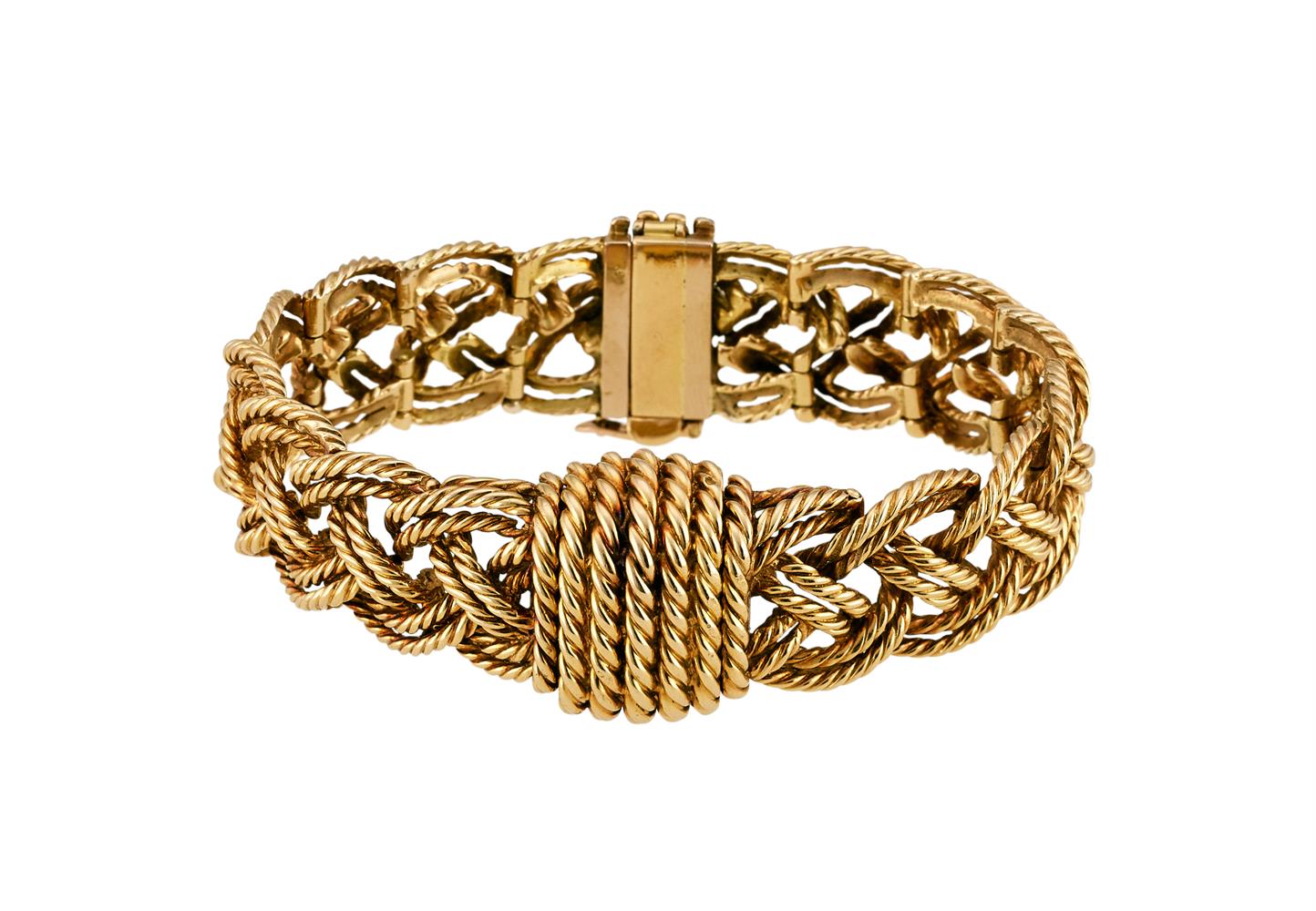 BOUCHERON, A LADY'S GOLD COLOURED BRACELET WATCH, NO. 6450 4616 73.048, CIRCA 1950