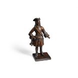 A RARE CARVED OAK MODEL OF A EUROPEAN MERCHANT OR ARMY OFFICER, 18TH CENTURY