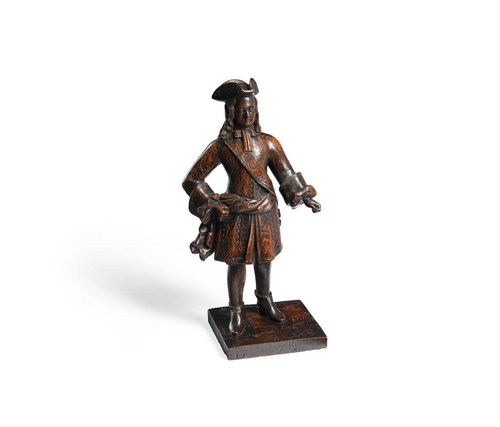 A RARE CARVED OAK MODEL OF A EUROPEAN MERCHANT OR ARMY OFFICER, 18TH CENTURY