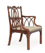 A GEORGE III MAHOGANY ARMCHAIR, IN CHIPPENDALE 'GOTHICK' MANNER, CIRCA 1770