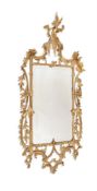 A GEORGE III CARVED GILTWOOD WALL MIRROR, SECOND HALF 18TH CENTURY